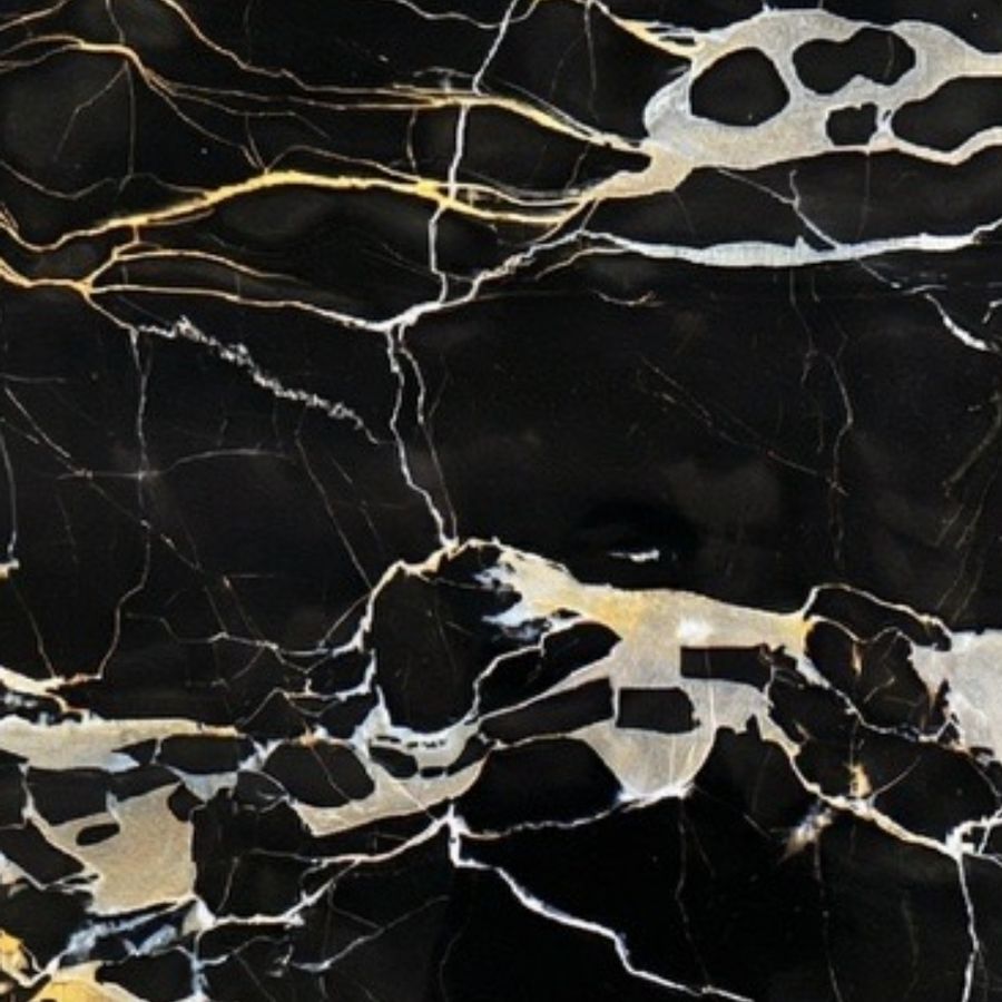 Portoro Extra Gold — jet black limestone threaded with gold veins